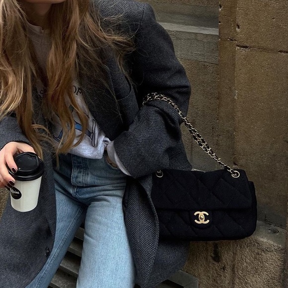 CHANEL Handbags - Chanel black vintage quilted jersey flap bag